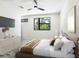 Bright bedroom with neutral tones, large window, and modern furnishings at 1607 Flower Dr, Sarasota, FL 34239
