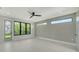 Bright bedroom with lots of natural light, and a door to the outside at 1607 Flower Dr, Sarasota, FL 34239