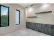 Modern bedroom with ample storage, sleek cabinetry, and a bright, airy feel at 1607 Flower Dr, Sarasota, FL 34239