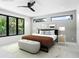 Modern bedroom with stylish decor, large window, and neutral accents at 1607 Flower Dr, Sarasota, FL 34239