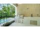 Outdoor kitchen features a built-in grill, countertop space, and pool views, ideal for al fresco dining at 1607 Flower Dr, Sarasota, FL 34239