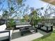 Inviting outdoor patio with stylish furniture, perfect for entertaining or relaxing outdoors at 1607 Flower Dr, Sarasota, FL 34239