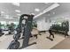 Well-equipped gym with weight machines, treadmills, and free weights for a complete fitness experience at 18317 Gulf Ranch Pl, Bradenton, FL 34211