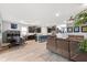 Open concept with modern kitchen, dining, and living space at 18317 Gulf Ranch Pl, Bradenton, FL 34211