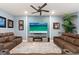 Cozy living room with comfortable seating, large screen TV, and stylish decor for relaxation at 18317 Gulf Ranch Pl, Bradenton, FL 34211