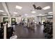 Well-equipped fitness center with modern exercise machines, weights, and mirrored walls at 2045 Gulf Of Mexico Dr # M1-505, Longboat Key, FL 34228