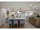 Kitchen with a large center island, stainless steel appliances, and hardwood style flooring at 2045 Gulf Of Mexico Dr # M1-505, Longboat Key, FL 34228