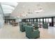 Spacious community lounge area with comfortable seating, tables, and ocean views at 2045 Gulf Of Mexico Dr # M1-505, Longboat Key, FL 34228