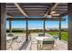 Relaxing outdoor seating area with ocean views, perfect for enjoying the beach breeze at 2045 Gulf Of Mexico Dr # M1-505, Longboat Key, FL 34228