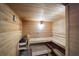 Inviting sauna with wooden benches, providing a relaxing and therapeutic experience at 2045 Gulf Of Mexico Dr # M1-505, Longboat Key, FL 34228