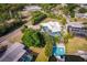 Aerial view of the home's pool and backyard showing the beautiful pool and boat dock at 2159 Constitution Blvd, Sarasota, FL 34231