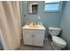 Cozy bathroom with a single sink vanity and a toilet at 2159 Constitution Blvd, Sarasota, FL 34231