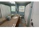 Bathroom featuring a single vanity, framed mirror, and shower with a white curtain at 2159 Constitution Blvd, Sarasota, FL 34231