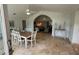 Dining room featuring tile floors, a large table for eight, and an open floor plan with bright, airy lighting at 2159 Constitution Blvd, Sarasota, FL 34231