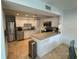 Bright kitchen with white cabinets, stainless steel appliances, and plenty of counter space for cooking and entertaining at 2159 Constitution Blvd, Sarasota, FL 34231