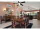 Spacious dining area with a large table, seating for six, and stylish decor at 22063 Lake Lindsey Rd, Brooksville, FL 34601
