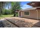 Exterior view of ranch-style home and front deck at 22063 Lake Lindsey Rd, Brooksville, FL 34601