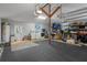 Spacious garage with laundry area, ample storage, and epoxy flooring at 22063 Lake Lindsey Rd, Brooksville, FL 34601