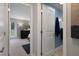 Hallway view into the main bedroom with ensuite bathroom and access to private yard at 22063 Lake Lindsey Rd, Brooksville, FL 34601