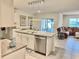 Modern kitchen with stainless steel appliances, granite countertops, and pendant lighting at 2410 Mizner Bay Ave, Bradenton, FL 34208