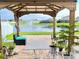 Picturesque view of a community pond featuring a water fountain at 2410 Mizner Bay Ave, Bradenton, FL 34208