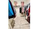 Organized walk-in closet with ample hanging space and shelving for shoes and accessories at 2410 Mizner Bay Ave, Bradenton, FL 34208