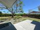 Back yard with lush landscaping, providing privacy and a serene outdoor space at 2420 16Th W St, Palmetto, FL 34221