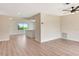 Open-concept living area featuring modern flooring, neutral paint, and seamless flow at 2420 16Th W St, Palmetto, FL 34221
