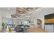 Spacious clubhouse featuring modern lighting, sleek decor, and comfortable seating areas at 26000 Seastone Dr, Englewood, FL 34223