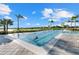 Lap pool for fitness enthusiasts, offering a dedicated swimming area with pristine water and poolside amenities at 26000 Seastone Dr, Englewood, FL 34223