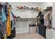 Walk-in closet with ample storage solutions for clothes and accessories at 26000 Seastone Dr, Englewood, FL 34223