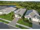 Beautiful aerial view of a one story home with mature landscaping at 2794 Butterfly Jasmine Trl, Sarasota, FL 34240