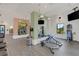 Bright gym featuring modern exercise equipment, mirrors, and neutral color palette at 2794 Butterfly Jasmine Trl, Sarasota, FL 34240