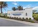 Entrance sign to the Windward Lakewood Ranch community with landscaping at 2794 Butterfly Jasmine Trl, Sarasota, FL 34240
