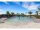 Fun community splash pad with interactive water features and plenty of lounge chairs at 2794 Butterfly Jasmine Trl, Sarasota, FL 34240
