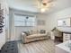 Bedroom featuring a comfy sofa, desk area, and natural light from a window at 2801 21St W Ave, Bradenton, FL 34205
