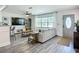 Comfortable living room boasting wood floors, contemporary decor, and large windows that flood the space with natural light at 2801 21St W Ave, Bradenton, FL 34205