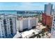 Aerial view showcases city skyline, harbor, and a mix of residential and commercial buildings at 33 S Gulfstream Ave # 306, Sarasota, FL 34236