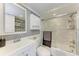 Clean bathroom features white tile, a modern sink, updated fixtures, and a glass shower door at 33 S Gulfstream Ave # 306, Sarasota, FL 34236