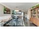 Elegant dining room with stylish light fixture, modern decor, and comfortable seating at 33 S Gulfstream Ave # 306, Sarasota, FL 34236