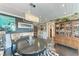 Elegant dining room with stylish decor, modern lighting, and comfortable seating arrangement at 33 S Gulfstream Ave # 306, Sarasota, FL 34236