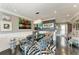Cozy dining room with zebra print chairs, modern light fixture, and stylish decor at 33 S Gulfstream Ave # 306, Sarasota, FL 34236
