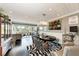 Open dining room features large windows, zebra print chairs, and stylish light fixture at 33 S Gulfstream Ave # 306, Sarasota, FL 34236