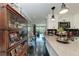 Bright kitchen with white cabinets, stainless steel appliances, and a gray countertop at 33 S Gulfstream Ave # 306, Sarasota, FL 34236