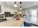 Modern kitchen with stainless appliances and plenty of countertop space for cooking at 33 S Gulfstream Ave # 306, Sarasota, FL 34236