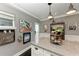 Stylish kitchen with gray walls, white cabinets, stainless appliances, and elegant decor at 33 S Gulfstream Ave # 306, Sarasota, FL 34236