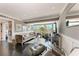 Cozy living room with plush seating, a large window, and modern decor at 33 S Gulfstream Ave # 306, Sarasota, FL 34236