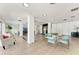 Inviting lobby with comfortable seating, tile floors, and a stylish chandelier at 33 S Gulfstream Ave # 306, Sarasota, FL 34236