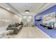Comfortable lobby with plush seating, elegant lighting, and soothing blue accent wall at 33 S Gulfstream Ave # 306, Sarasota, FL 34236