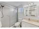 Bathroom featuring shower with sliding doors, toilet, and vanity at 3521 Lake Bayshore Dr # 3521, Bradenton, FL 34205